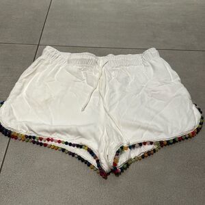 Woman’s White Pom Pom beach shorts, size S